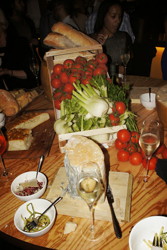 More cheese, vegetables and bread - can you spy someone in the background?
